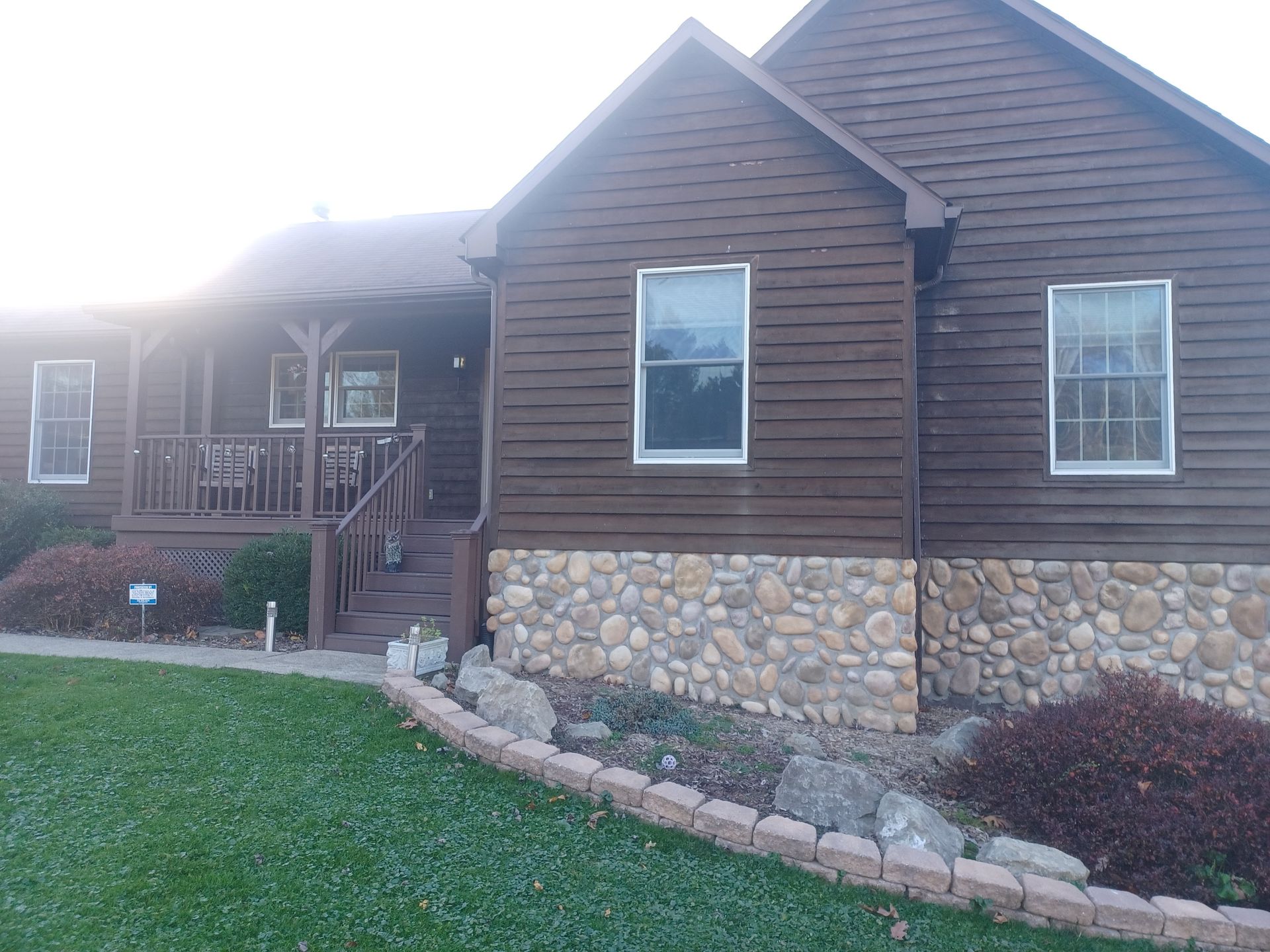 Completed home exterior remodeling project — new windows and siding, Western PA